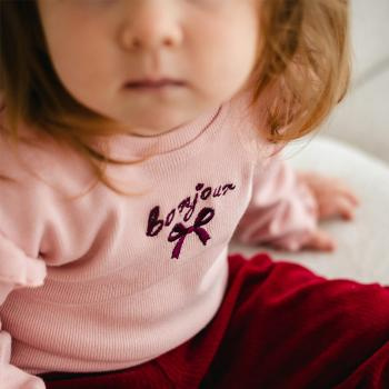 Fluffy Tails Eevi bluza pentru bebelusi cu nervuri - roz, cu volane pe umeri