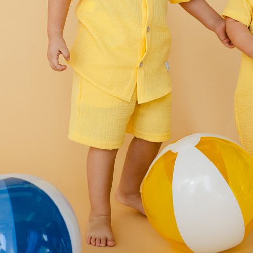 Pantaloni scurti de muselina Elephant Eevi - galbeni